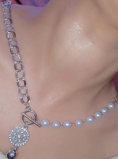 golden and silver curb necklace