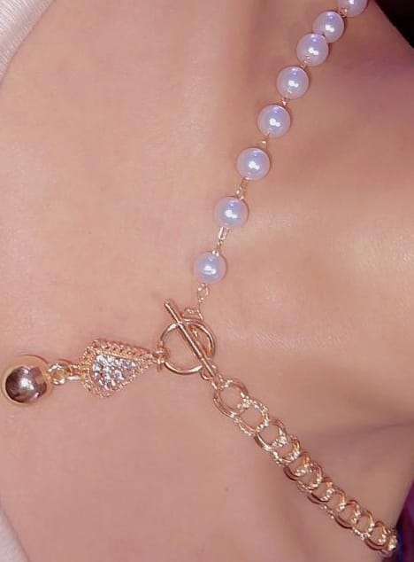 golden and silver curb necklace