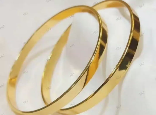 gold metal bangles pair